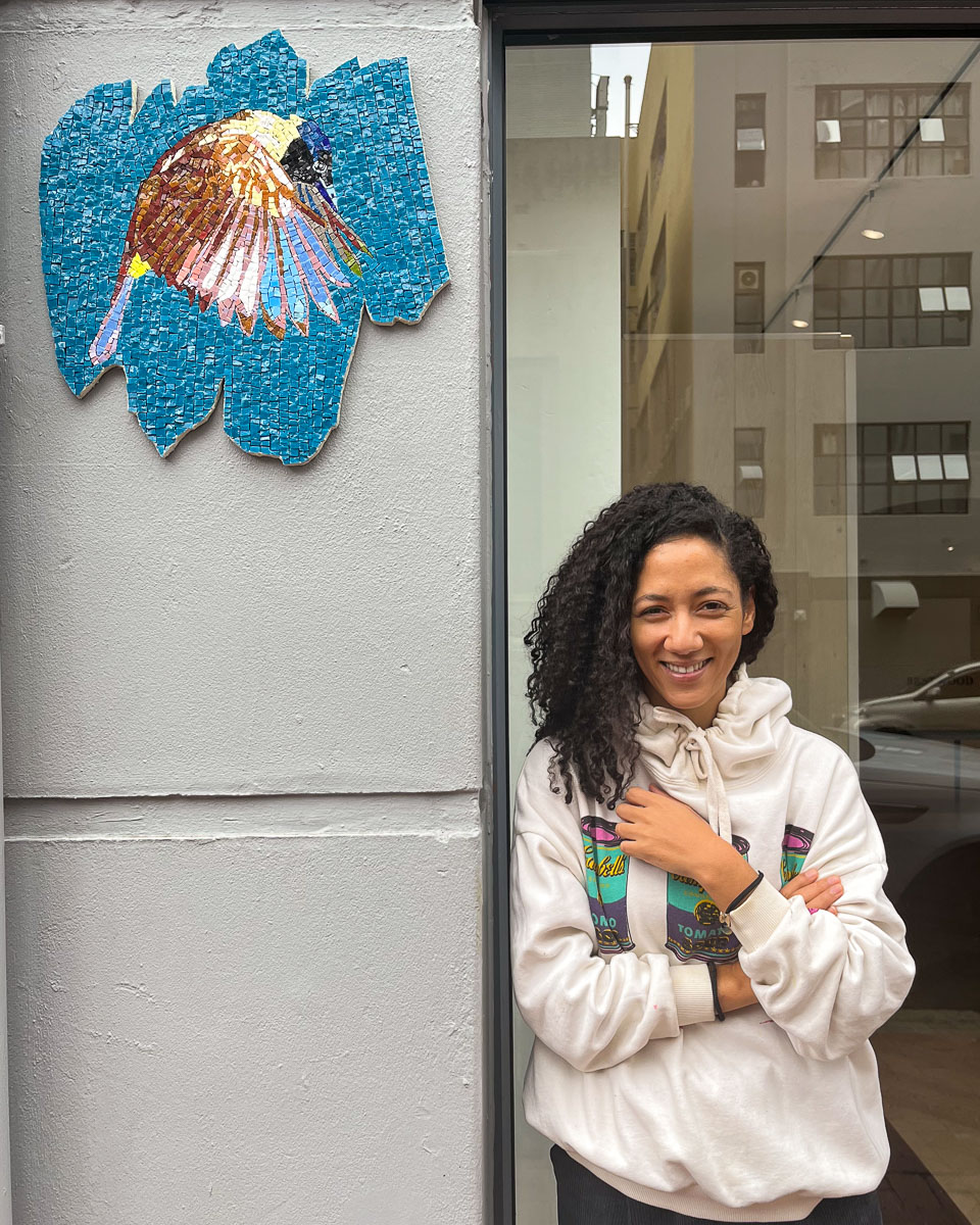 Robyn Pretorius stands next to the Mosaic Bomb